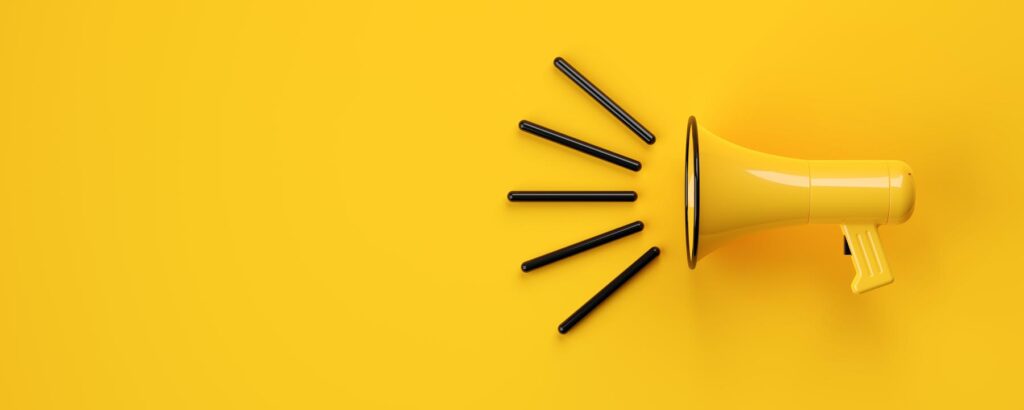 yellow graphic illustration of a megaphone for the article what is brand marketing
