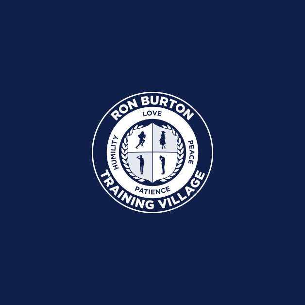 White, circular logo on navy blue background with the text "Ron Burton Training Village", "Love Peace, Patience, Humility" and 4 figures, a person saluting, and a person with their head bowed and hands together in prayer.